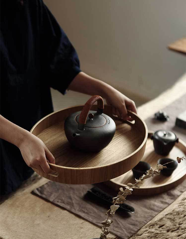 Slim, round wooden serving trays