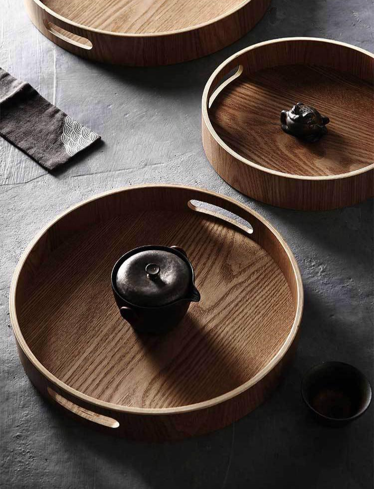 Slim, round wooden serving trays