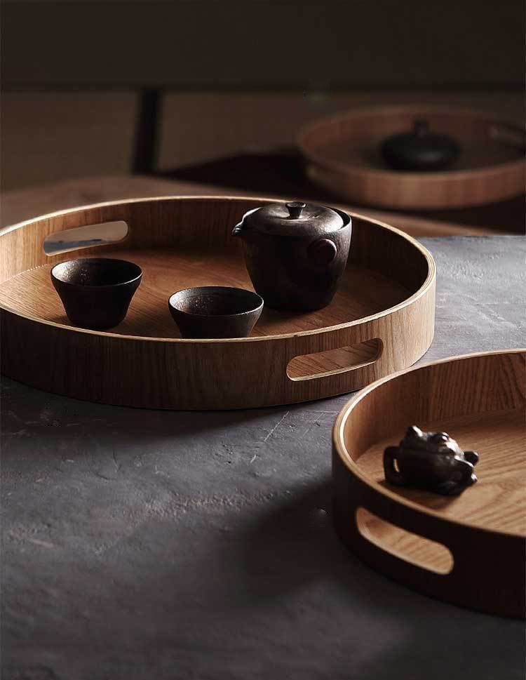 Slim, round wooden serving trays