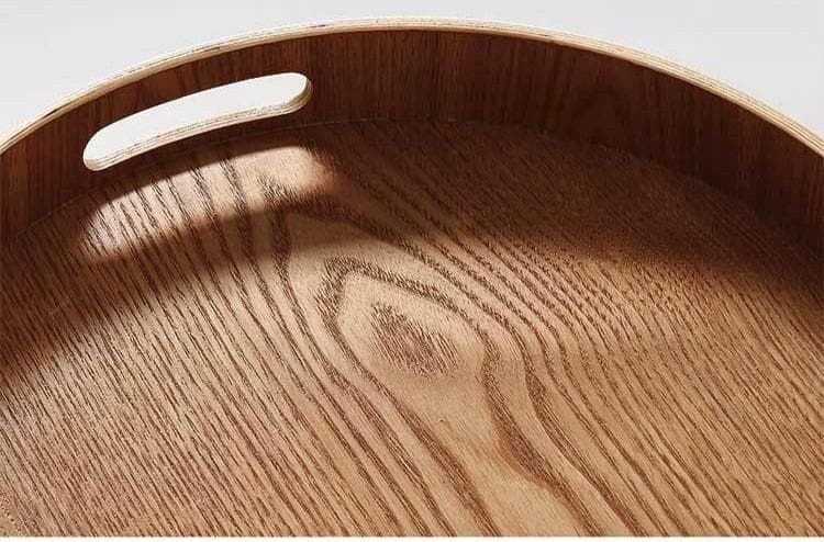 Slim, round wooden serving trays